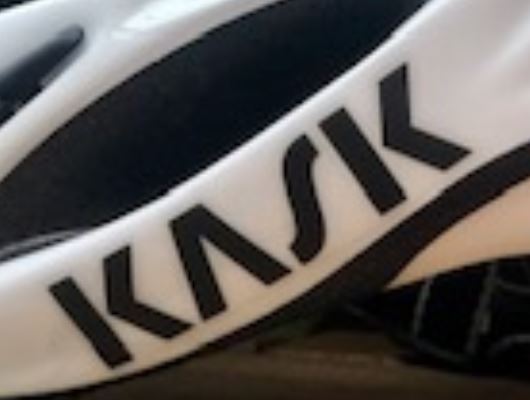 A close up of the KASK Road bike helmet logo  